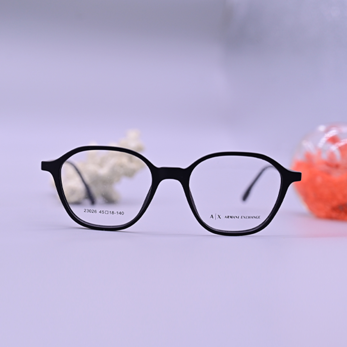 نظارة ارماني اكس تشانج طبية موديل 23026 بإطار كامل دائري بلون أسود مطفي وأذرع نحيفة من متجر عين العون.